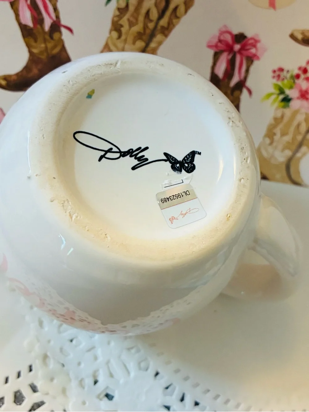 Dolly Parton Creamer NEW Dolly Parton butterfly creamer minor chip. Never used